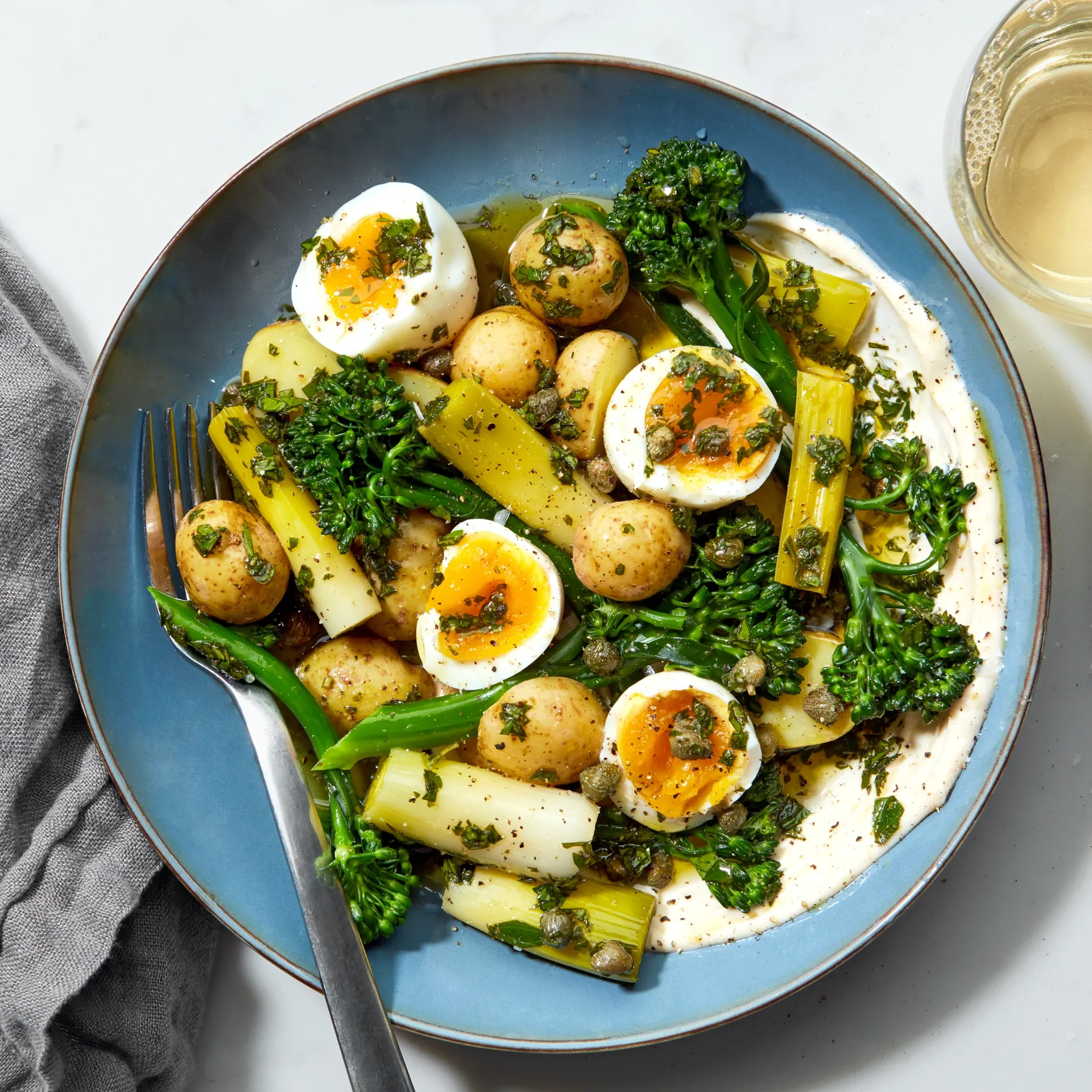 Healthy steamed vegetables, eggs, and potatoes served as a nutritious home-cooked meal