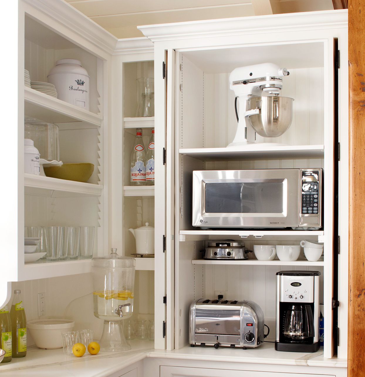 Smart storage of kitchen appliances inside a cabinet, keeping small appliances organized and easy to access