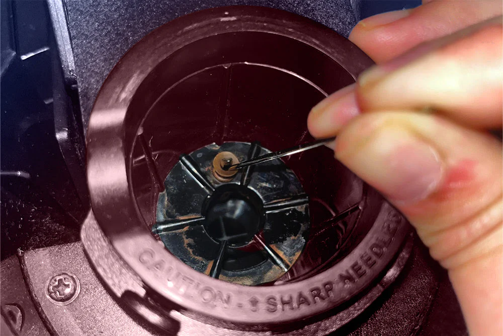 Blocked internal coffee maker water lines causing slow brewing