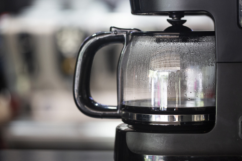 Coffee maker brewing slowly with minimal coffee collecting in the carafe
